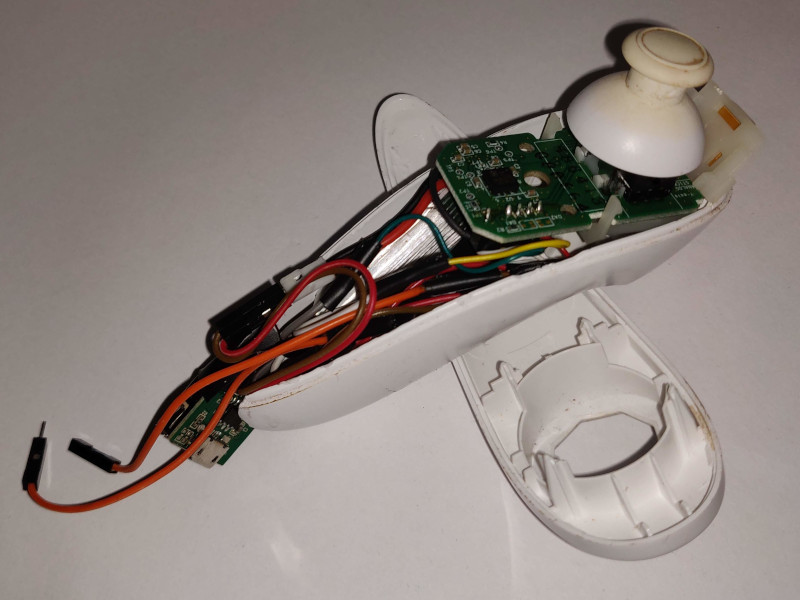 A Gif of a hacked wii nunchuck being used to move a robot prototype